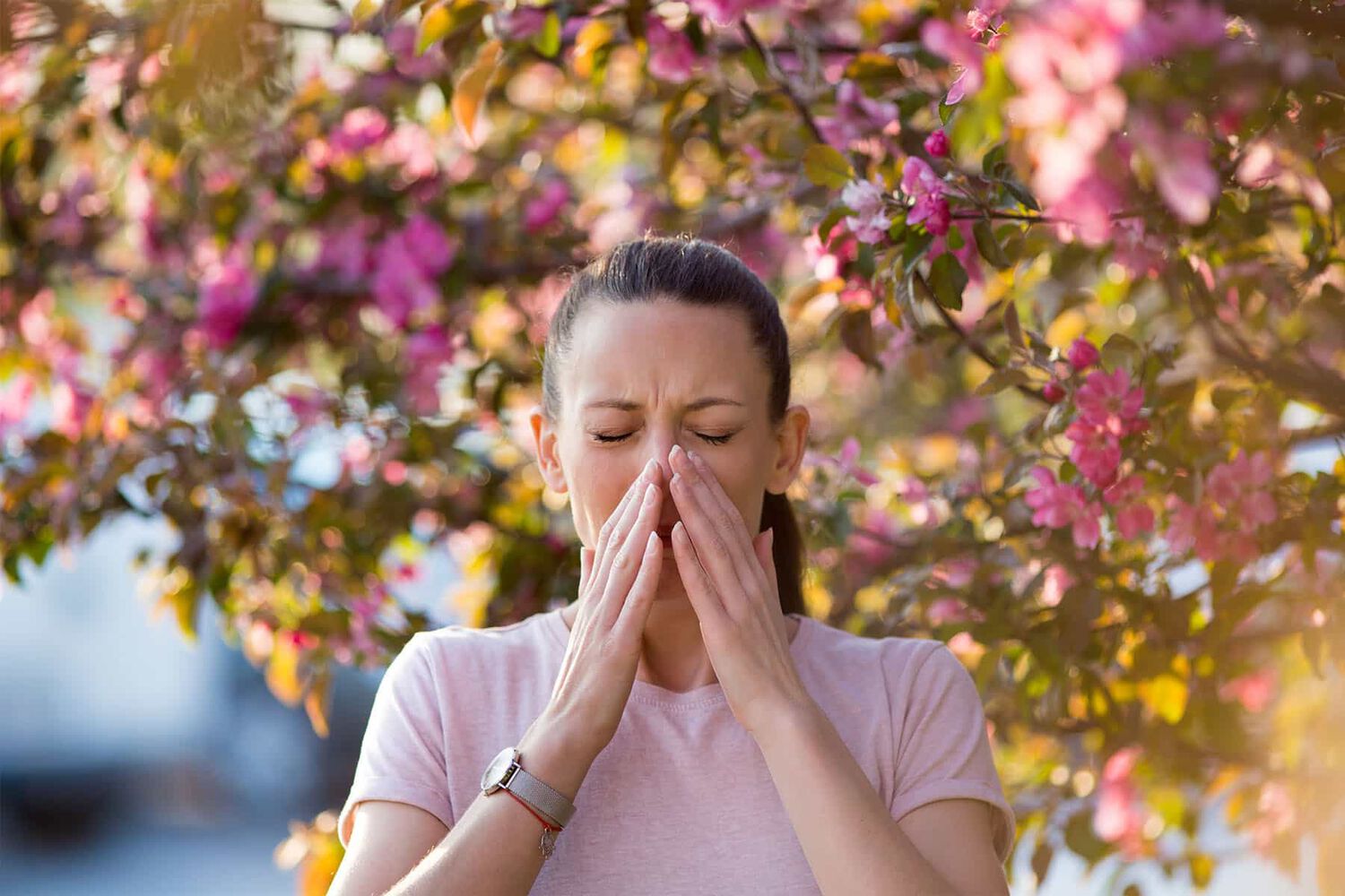 A Woman Sneezing