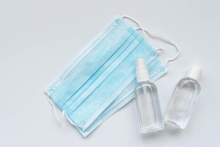Masks and bottles of hand sanitizer