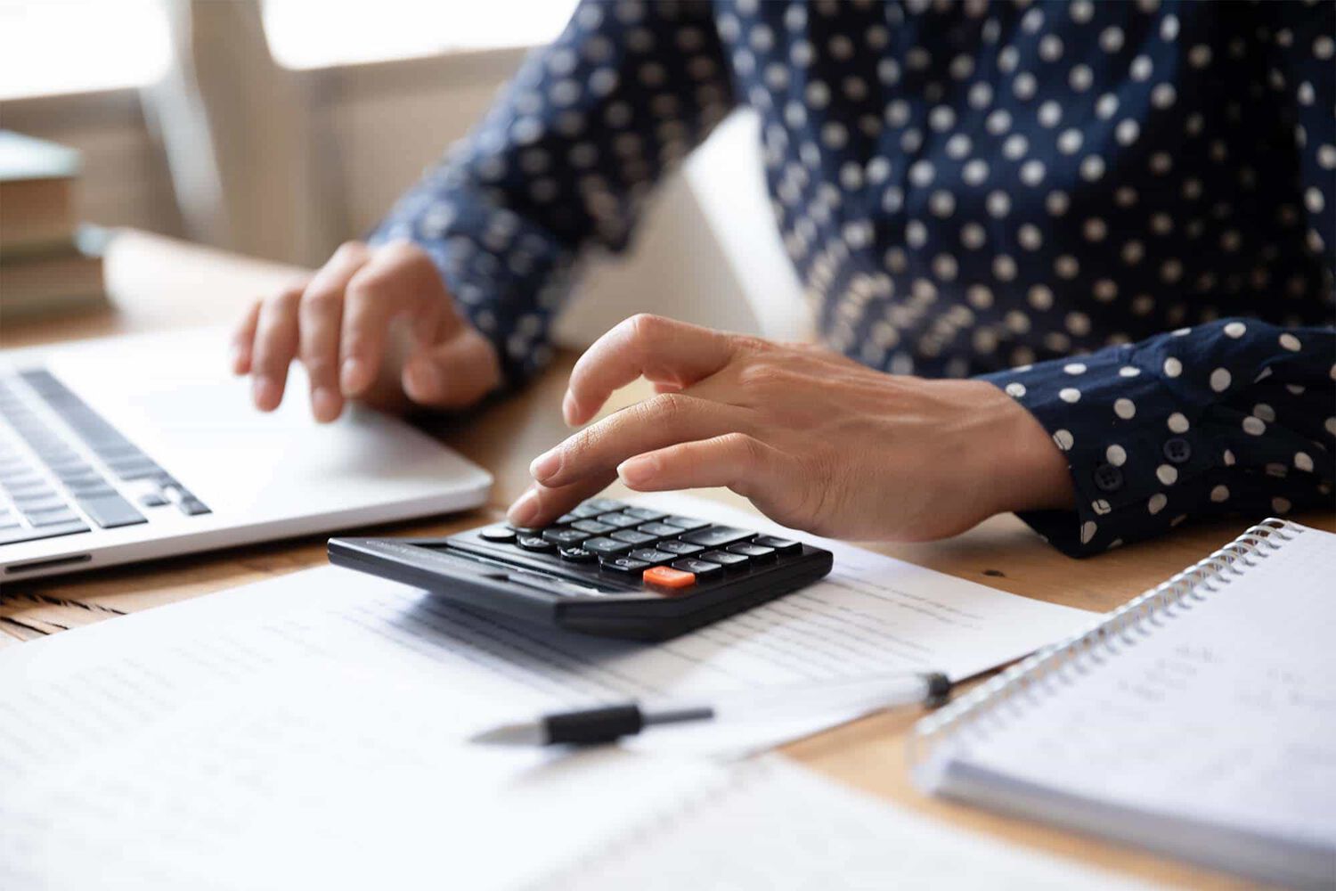person calculating FSA contributions